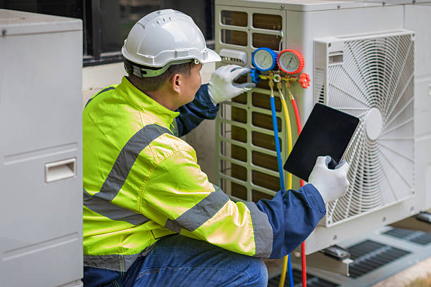 Professional Heat Pump Repair technician working in Bynum, AL